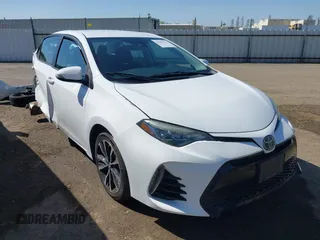 2017 Toyota Corolla L z VIN 5YFBURHE5HP679489, wystawiony jako IAAI lot #42201134 z przebiegiem 143 137 mil mil oraz . Historia ofert i sprzedaży dostępna na DreamBid. Obrazek 1.