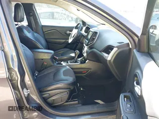 2014 Jeep Cherokee Trailhawk with VIN 1C4PJMBB0EW237741, listed as a IAAI auction lot 40505251 with 139,883 mi miles and . Bid and sale history available at DreamBid. Image 5.