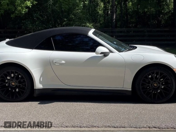 2014 Porsche 911 Carrera z VIN WP0CA2A92ES140453, wystawiony jako IAAI lot #42302853 z przebiegiem 47 879 mil mil oraz . Historia ofert i sprzedaży dostępna na DreamBid. Obrazek 14.