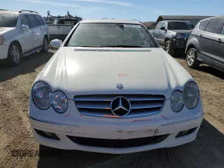 2009 Mercedes-Benz CLK-Class 3.5L with VIN WDBTJ56H39F264312, listed as a Copart auction lot 76835154 with 125,624 mi miles and Salvage Title. Bid and sale history available at carsss.com. Image 5.