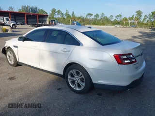 2013 Ford Taurus SEL z VIN 1FAHP2E88DG214441, wystawiony jako IAAI lot #42232859 z przebiegiem 122 388 mil mil oraz . Historia ofert i sprzedaży dostępna na DreamBid. Obrazek 3.