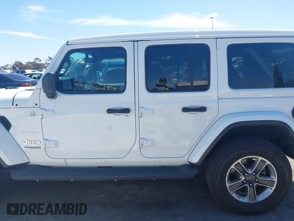 2019 Jeep Wrangler Unlimited Sahara with VIN 1C4HJXENXKW684942, listed as a IAAI auction lot 42021869 with 55,137 mi miles and . Bid and sale history available at DreamBid. Image 14.