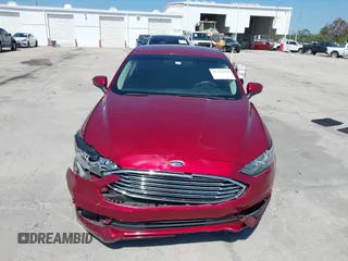 2018 Ford Fusion SE z VIN 3FA6P0LU9JR279976, wystawiony jako IAAI lot #41792558 z przebiegiem 115 790 mil mil oraz . Historia ofert i sprzedaży dostępna na DreamBid. Obrazek 12.