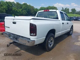 2003 Dodge 1500 ST z VIN 1D7HA18N13S364951, wystawiony jako IAAI lot #42426006 z przebiegiem 290 165 mil mil oraz . Historia ofert i sprzedaży dostępna na DreamBid. Obrazek 4.