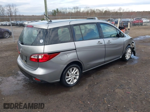 2012 Mazda 5 Sport with VIN JM1CW2BLXC0107933, listed as a IAAI auction lot 41813231 with 164,395 mi miles and . Bid and sale history available at DreamBid. Image 4.