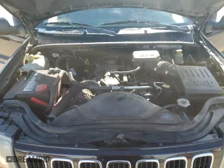 2002 Jeep Grand Cherokee Laredo with VIN 1J4GW48S82C241889, listed as a Copart auction lot 46252045 with 215,697 mi miles and Salvage Title. Bid and sale history available at carsss.com. Image 14.