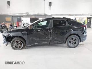 2024 Subaru Solterra Touring with VIN JTMABABA9RA052065, listed as a IAAI auction lot 42648692 with 13,880 mi miles and . Bid and sale history available at DreamBid. Image 6.