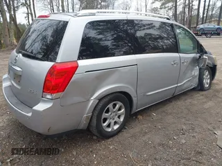2009 Nissan Quest SL with VIN 5N1BV28U59N105982, listed as a IAAI auction lot 41795063 with 127,008 mi miles. Bid and sale history available at carsss.com. Image 4.