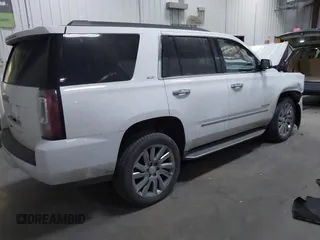 2020 GMC Yukon SLT with VIN 1GKS2BKC2LR175800, listed as a IAAI auction lot 41225753 with 80,333 mi miles. Bid and sale history available at carsss.com. Image 4.
