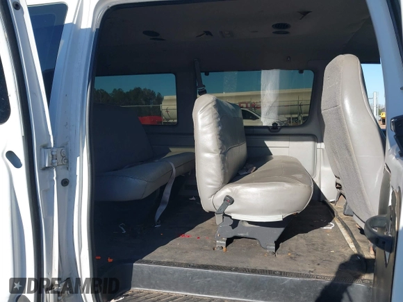 2001 Ford Econoline Passenger XL with VIN 1FBSS31S11HA07065, listed as a IAAI auction lot 41717128 with 112,584 mi miles and . Bid and sale history available at DreamBid. Image 8.