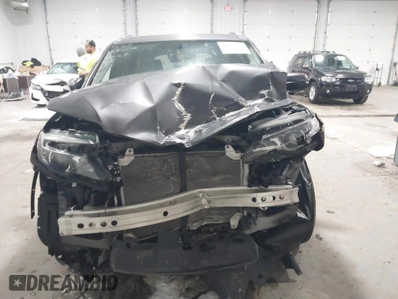 2017 Honda Pilot EX-L with VIN 5FNYF6H51HB080796, listed as a IAAI auction lot 40702843 with Not Provided miles and . Bid and sale history available at DreamBid. Image 11.