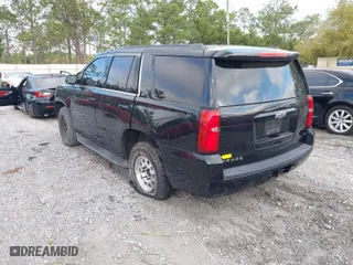 2015 Chevrolet Tahoe LT with VIN 1GNSCBKCXFR687597, listed as a IAAI auction lot 41935279 with 213,290 mi miles. Bid and sale history available at carsss.com. Image 3.