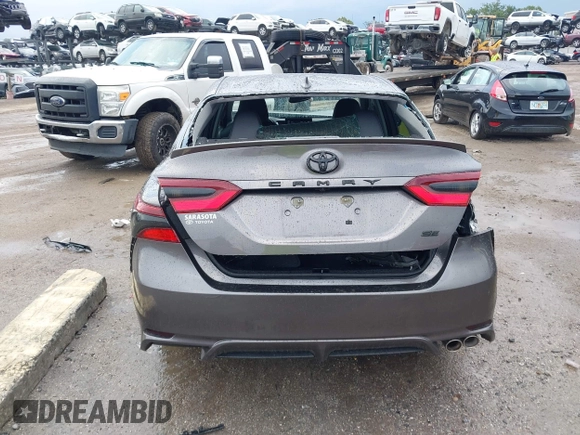 2023 Toyota Camry SE z VIN 4T1T11AK8PU802097, wystawiony jako IAAI lot #42389754 z przebiegiem 19 732 mil mil oraz . Historia ofert i sprzedaży dostępna na DreamBid. Obrazek 16.