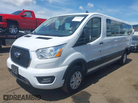 2021 Ford Transit Passenger XL z VIN 1FBAX2Y87MKA31170, wystawiony jako IAAI lot #42348150 z przebiegiem 60 124 mil mil oraz . Historia ofert i sprzedaży dostępna na DreamBid. Obrazek 18.