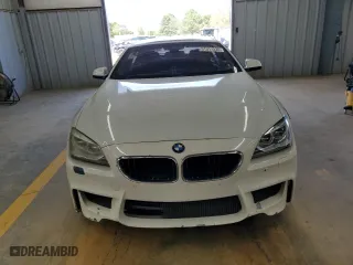 2015 BMW 6 Series 650i with VIN WBA6B2C5XFD799226, listed as a Copart auction lot 51317235 with 128,464 mi miles and Clean Title. Bid and sale history available at carsss.com. Image 5.