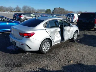 2023 Kia Rio LX with VIN 3KPA24ADXPE606463, listed as a IAAI auction lot 41728523 with 8,909 mi miles and . Bid and sale history available at DreamBid. Image 4.