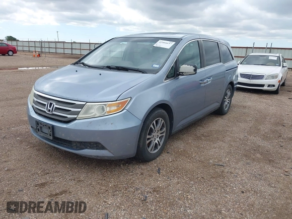 2011 Honda Odyssey EX-L with VIN 5FNRL5H64BB085479, listed as a IAAI auction lot 42404637 with 185,624 mi miles and . Bid and sale history available at DreamBid. Image 17.