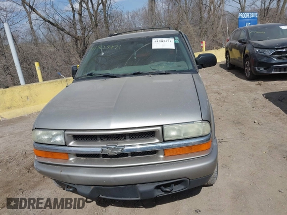 2004 Chevrolet Blazer LS z VIN 1GNDT13X04K164924, wystawiony jako IAAI lot #41803471 z przebiegiem 166 708 mil mil oraz . Historia ofert i sprzedaży dostępna na DreamBid. Obrazek 12.