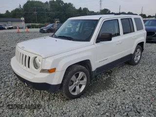 2015 Jeep Patriot Latitude with VIN 1C4NJPFB9FD329558, listed as a Copart auction lot 62367745 with 152,837 mi miles and Salvage title. Bid and sale history available at DreamBid. Image 1.