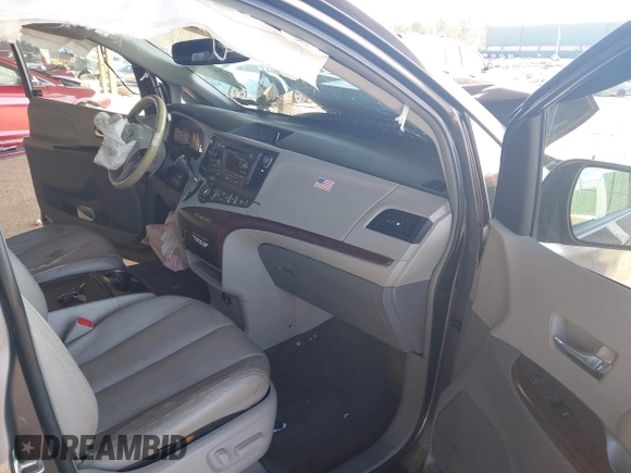 2014 Toyota Sienna XLE with VIN 5TDYK3DC5ES433949, listed as a IAAI auction lot 42095625 with 337,642 mi miles and . Bid and sale history available at DreamBid. Image 5.