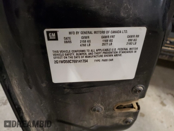 2006 Chevrolet Impala SS with VIN 2G1WD58C769141794, listed as a Copart auction lot 87957155 with 123,034 mi miles and Salvage Title. Bid and sale history available at DreamBid. Image 14.