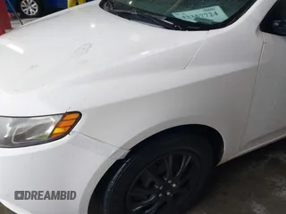 2010 Kia Forte EX z VIN KNAFU4A29A5858736, wystawiony jako IAAI lot #42357724 z przebiegiem 181 399 mil mil oraz . Historia ofert i sprzedaży dostępna na DreamBid. Obrazek 6.