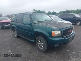 2000 GMC Denali z VIN 1GKEK63R1YR212575, wystawiony jako IAAI lot #42076971 z przebiegiem 241 471 mil mil oraz . Historia ofert i sprzedaży dostępna na DreamBid. Obrazek 1.