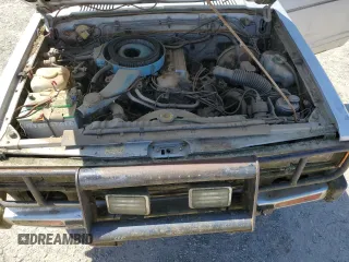 1981 Datsun 720 z VIN JN6MD02Y8BW002679, wystawiony jako Copart lot #54803875 z przebiegiem 109 018 mil mil oraz Tytuł czysty. Historia ofert i sprzedaży dostępna na DreamBid. Obrazek 11.
