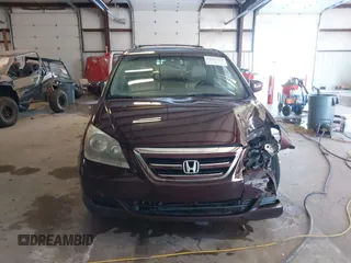 2007 Honda Odyssey EX-L with VIN 5FNRL38727B066885, listed as a IAAI auction lot 41317374 with 220,243 mi miles. Bid and sale history available at carsss.com. Image 12.