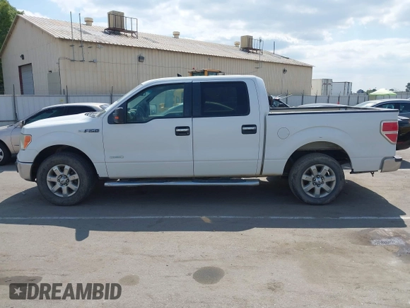 2014 Ford F-150 XL with VIN 1FTFW1CT8EKF55164, listed as a IAAI auction lot 42111483 with 233,166 mi miles. Bid and sale history available at carsss.com. Image 15.