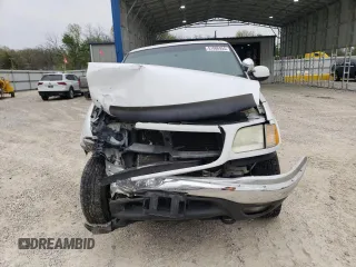 2002 Ford F-150 XL with VIN 1FTRX18L42NB60380, listed as a Copart auction lot 51806955 with 293,591 mi miles and Salvage title. Bid and sale history available at DreamBid. Image 5.