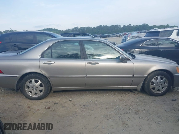 2002 Acura RL с VIN JH4KA965X2C012055, выставлен на аукционе IAAI как лот 42273551 с пробегом 148 392 миль миль и . История ставок и продаж доступна на DreamBid. Изображение 13.