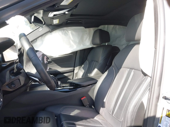 2022 BMW 5 Series M550i xDrive with VIN WBA13BK02NCJ61943, listed as a IAAI auction lot 41607980 with Not provided miles and . Bid and sale history available at DreamBid. Image 20.