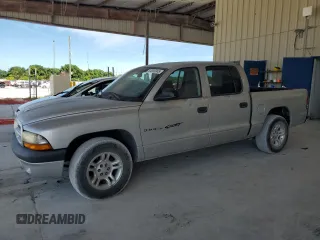 2001 Dodge Dakota with VIN 1B7HL2AX11S292944, listed as a Copart auction lot 64800045 with 145,279 mi miles and Clean title. Bid and sale history available at DreamBid. Image 1.
