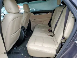 2018 Cadillac XT5 FWD with VIN 1GYKNARS6JZ147628, listed as a Copart auction lot 57516595 with 113,092 mi miles and Non repairable. Bid and sale history available at DreamBid. Image 10.