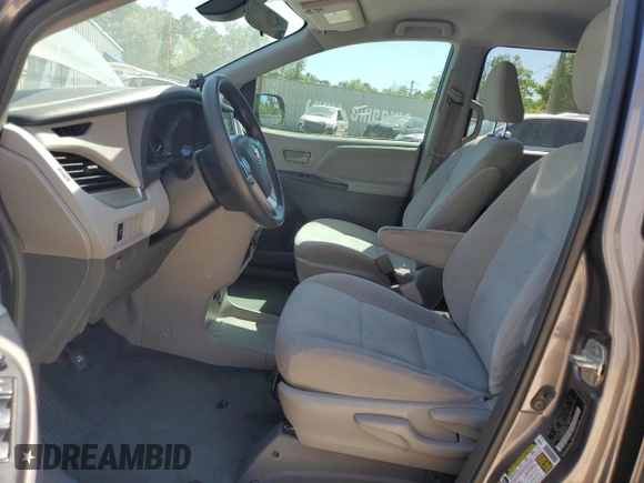 2019 Toyota Sienna L with VIN 5TDZZ3DC1KS991616, listed as a Copart auction lot 52879285 with Not Provided miles and Salvage Title. Bid and sale history available at DreamBid. Image 7.