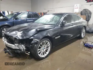 2013 BMW 7 Series 740i with VIN WBAYA6C51DC995111, listed as a Copart auction lot 87131184 with 94,535 mi miles and Salvage Title. Bid and sale history available at carsss.com. Image 1.