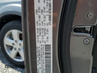 2013 Dodge Journey American Value with VIN 3C4PDCAB8DT566999, listed as a Copart auction lot 61361315 with 183,897 mi miles and Salvage title. Bid and sale history available at DreamBid. Image 13.