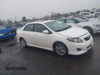 2010 Toyota Corolla with VIN 2T1BU4EEXAC413978, listed as a IAAI auction lot 41953898 with 121,676 mi miles. Bid and sale history available at carsss.com. Image 14.