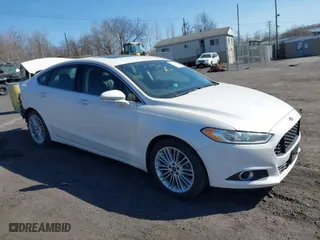 2016 Ford Fusion SE with VIN 3FA6P0H98GR231009, listed as a IAAI auction lot 41776509 with 116,988 mi miles. Bid and sale history available at carsss.com. Image 1.