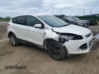 2014 Ford Escape SE z VIN 1FMCU9G96EUD93590, wystawiony jako Copart lot #57810015 z przebiegiem 146 919 mil mil oraz Czysty tytuł • Clean title. Historia ofert i sprzedaży dostępna na DreamBid. Obrazek 4.