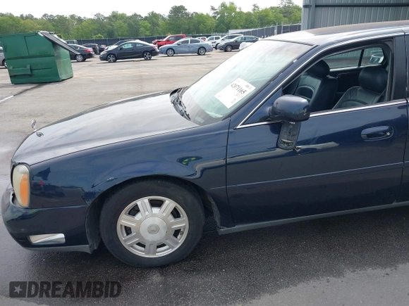 2003 Cadillac DeVille with VIN 1G6KD54Y53U232586, listed as a IAAI auction lot 42071165 with 174,403 mi miles. Bid and sale history available at carsss.com. Image 6.