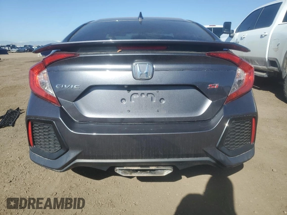 2018 Honda Civic Si with VIN 2HGFC1E57JH704397, listed as a Copart auction lot 51868535 with 44,620 mi miles and Salvage Title. Bid and sale history available at DreamBid. Image 6.