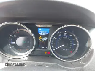 2012 Hyundai Sonata Hybrid z VIN KMHEC4A4XCA031014, wystawiony jako IAAI lot #42463501 z przebiegiem 113 309 mil mil oraz . Historia ofert i sprzedaży dostępna na DreamBid. Obrazek 7.