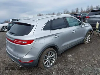 2015 Lincoln MKC with VIN 5LMTJ2AH6FUJ10863, listed as a IAAI auction lot 41983116 with 111,250 mi miles. Bid and sale history available at carsss.com. Image 4.