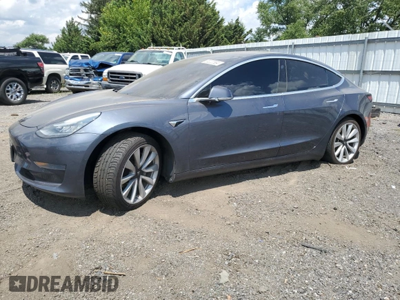 2020 Tesla Model 3 Standard Range Plus with VIN 5YJ3E1EA6LF614045, listed as a Copart auction lot 65222584 with 59,823 mi miles and Salvage Title. Bid and sale history available at DreamBid. Image 1.