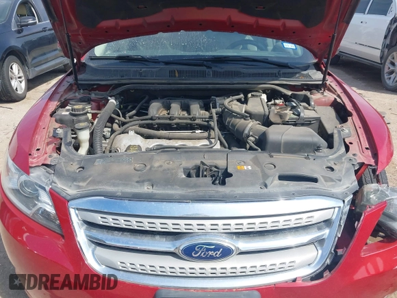 2011 Ford Taurus SEL z VIN 1FAHP2EW7BG123740, wystawiony jako IAAI lot #41890761 z przebiegiem 132 310 mil mil oraz . Historia ofert i sprzedaży dostępna na DreamBid. Obrazek 10.