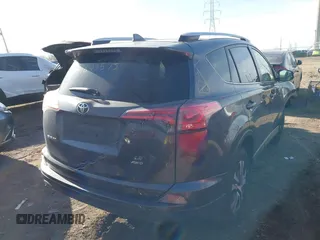 2016 Toyota RAV4 LE with VIN JTMBFREV1GJ085659, listed as a IAAI auction lot 41823575 with 141,657 mi miles. Bid and sale history available at carsss.com. Image 4.