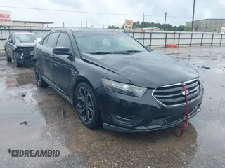 2013 Ford Taurus SHO z VIN 1FAHP2KT9DG144215, wystawiony jako IAAI lot #42107386 z przebiegiem 199 934 mil mil oraz . Historia ofert i sprzedaży dostępna na DreamBid. Obrazek 1.