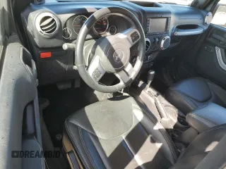 2014 Jeep Wrangler Rubicon with VIN 1C4BJWCG1EL168575, listed as a Copart auction lot 75095814 with 65,770 mi miles and Salvage title. Bid and sale history available at DreamBid. Image 8.